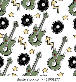 Seamless background. Vector pattern. Hand drawn guitars, stars, arrows.  Rock, grunge, punk style.