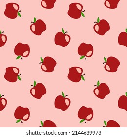 Seamless background vector red apples on pink background.