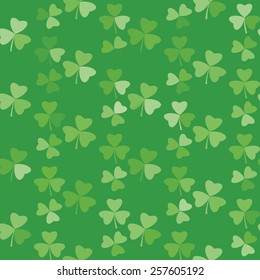 Seamless background. Vector shamrock. 