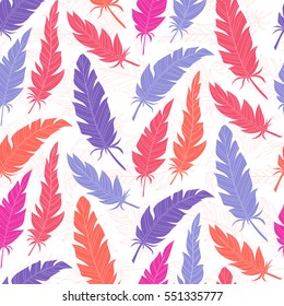 Seamless background vintage colored feathers. Pattern.