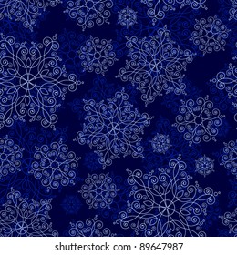 Seamless background with vintage snowflakes