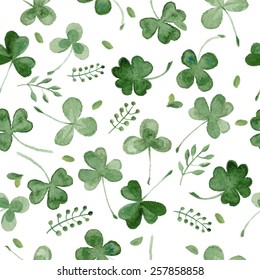 seamless background with watercolor clover and other grass. vector pattern for St. Patrick's Day.