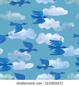 Seamless background from watercolor drawings of various light clouds and blue birds flying in sky