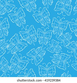 Seamless background with white butterflies 