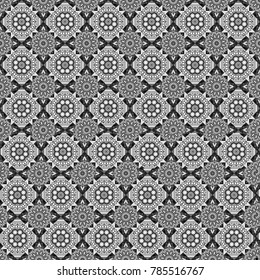 A seamless background. White, gray and black texture. Abstract ornament. Graphic vector pattern. Wallpaper in the geometrical style.