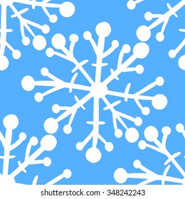 Seamless background with white snowflakes.