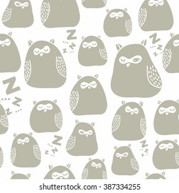 Seamless background with wild birds. Sleeping owls in the forest. Vector illustration.