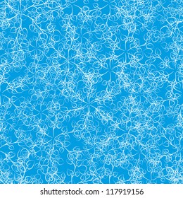 seamless background with winter snowflakes for your design