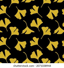 Seamless background of yellow gingko tree leaves on black