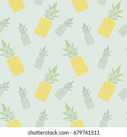 Seamless background with yellow and green pineapples and green leaves