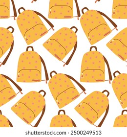 seamless background with yellow school backpacks, back to school.  