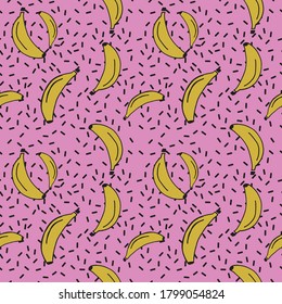 Seamless banana pattern with pink sprinkle background in 90s memphis style