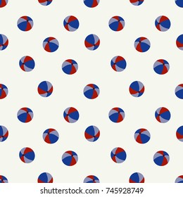 Seamless beach ball repeating background pattern. Beach balls in colors of red white and blue over a white  background.  Flat color style. Useful for 4th of July projects