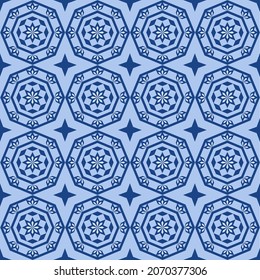 Seamless beautiful pattern of blue flowers in octagon shape with star are repeating on light blue background.Vector flat design for decorating, fabric,wrapping, textile, wallpaper,apparel,tile,mosaic.