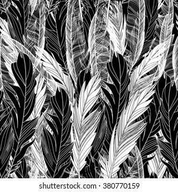 Seamless beautiful pattern feathers black white ornament. Vector illustration of a template for the design.

