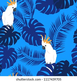 Seamless beautiful pattern with palm leaves, monsters and parrots on a blue background. For decorating textiles, packaging and wallpaper. Vector illustration.