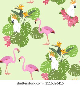 Seamless beautiful pattern with tropical plants, flamingos and a parrot. For decorating textiles, packaging and wallpaper. Vector illustration.