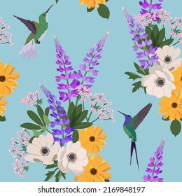 Seamless beautiful summer vector illustration with lupine, dahlia, anemone and hummingbirds on a blue background. For decorating textiles, packaging, wallpaper.