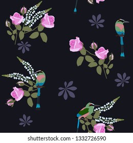 Seamless beautiful vector illustration with roses and exotic birds on a black background. For decorating textiles, packaging, web design.