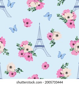 Seamless beautiful vector illustration of a stylized eiffel tower with anemone and butterflies on a blue background. For decorating textiles, packaging and wallpaper.