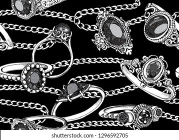Seamless beauty pattern. Finger Rings and necklaces on a black background. Textile composition, hand drawn style print. Vector illustration.