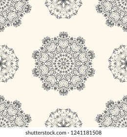 Seamless beige abstract background with gray floral ornament. Floral ornament on background. Template for your design. Wallpaper pattern