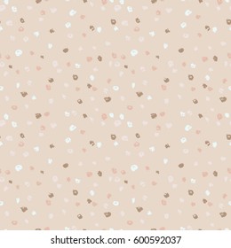 Seamless beige ink dots pattern. Vector grunge background. Vector illustration.