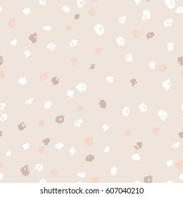 Seamless beige ink dots pattern. Vector grunge background. Vector illustration.