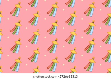 Seamless bell pattern with colorful ribbons on pink background. Pink seamless pattern with ribbon bell and dot illustrations. Repeating decorative bell pattern with hanging streamers