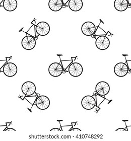 Seamless bicycles pattern. Black icons on white background. Sport print
