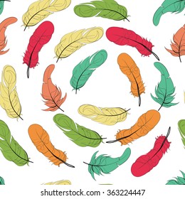 Seamless bird feather vector pattern background. Endless colorful texture. Yellow green orange red feathers on white