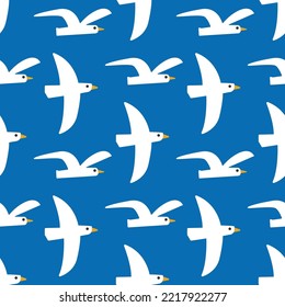 Seamless bird pattern on blue background. Vintage white bird cartoon