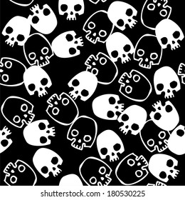 seamless black background with vector skulls