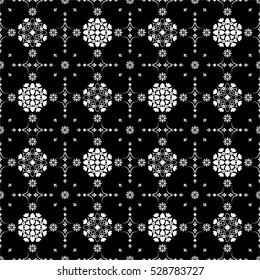 Seamless black background with white mandala pattern.