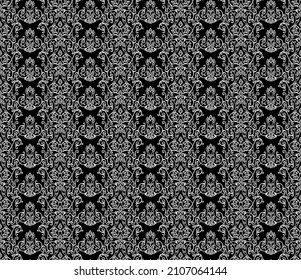 Seamless black background with white pattern in baroque style. Vector retro illustration. Ideal for printing on fabric or paper for wallpapers, textile, wrapping. 