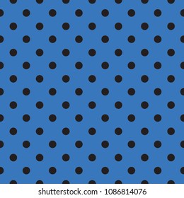 Seamless black and blue polka dot pattern background.