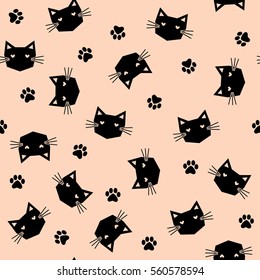 Seamless black cats with paws pattern on light peach background