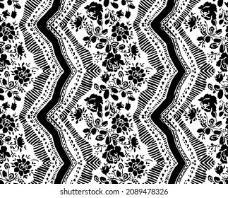 Seamless black folk pattern with flowers on white. Seamless vector flower border design in  Slavic European folk art.  trendy ethnic decorative flowers in symmetric allover design. 