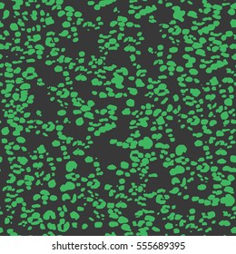 Seamless black and green leopard spots pattern