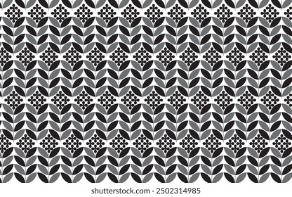 Seamless black leaf and flower shaped geometric pattern for tiles, wallpapers and backgrounds.