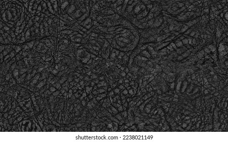 Seamless black leather texture. Dark leather surface close up. 