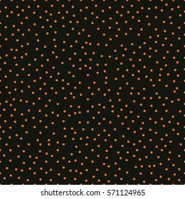 Seamless black and orange chaotic tileable polka dot pattern vector