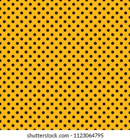 Seamless black and orange dot pattern background. Ideal for packaging designs.