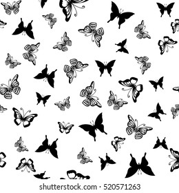 Seamless black pattern with silhouettes of butterflies