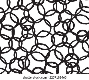 The seamless black and white abstract brush stoke pattern. The creative monochrome hand drawn background with circles for your design. Textile, blog decoration, banner, poster, wrapping paper.