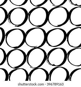 The seamless black and white abstract brush stoke pattern. The creative monochrome hand drawn background with circles for your design. Textile, blog decoration, banner, poster, wrapping paper.