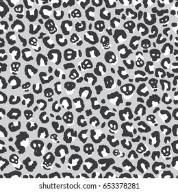 Seamless black and white animal leopard print with skulls pattern vector