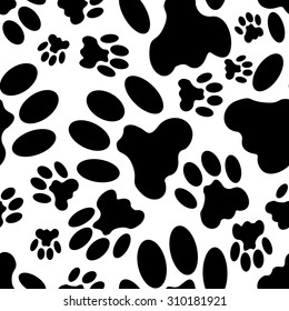 Seamless black and white background with cat tracks for creating card, web page background, wallpaper and textile.