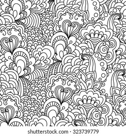 Seamless black and white background. Floral, ethnic, hand drawn elements for design. Good for coloring book for adults or design of wrapping and textile.