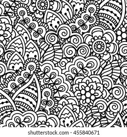 Seamless black and white background. Floral, ethnic, hand drawn elements for design. Good for coloring book for adults or design of wrapping and textile.